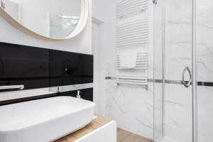 Kúpeľňa v ubytovaní Apartments Warsaw Pawia by Noclegi Renters