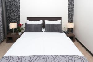 Postel nebo postele na pokoji v ubytování Hotel Beach Split