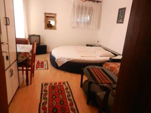 Ένα ή περισσότερα κρεβάτια σε δωμάτιο στο Apartments Sino More