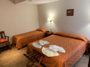 Katil atau katil-katil dalam bilik di Hotel Select