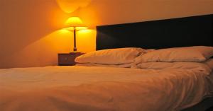 Postel nebo postele na pokoji v ubytování City View Hotel