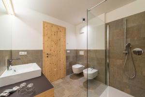 Vannituba majutusasutuses Hotel Alpenrast