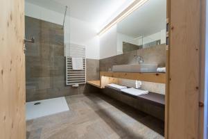 Vannituba majutusasutuses Hotel Alpenrast