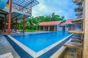 an image of a swimming pool at a villa at Olinia Airport Hotel in Katunayake