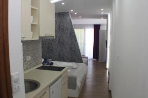 Kuchyň nebo kuchyňský kout v ubytování Casa Hena + 37 fotografií