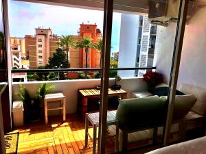 A seating area at Apartamento Flamingo Puerto Marina - 150m Playa