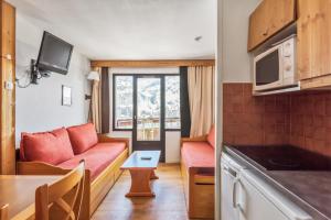 Kuchyň nebo kuchyňský kout v ubytování Residences Quartier Falaise - maeva Home