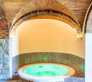 Fotografia z galérie ubytovania Relais Vignale & Spa v destinácii Radda in Chianti