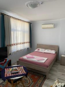 Postel nebo postele na pokoji v ubytování Blue Suites by V