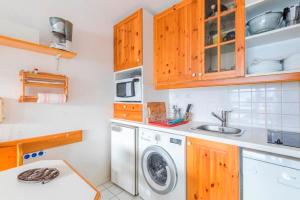 Kuchyň nebo kuchyňský kout v ubytování Residences Quartier Falaise - maeva Home