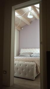 Postel nebo postele na pokoji v ubytování INTERNO 2 Este centro