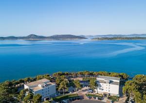 an aerial view of the lake with a building at Villas Arausana & Antonina in Vodice