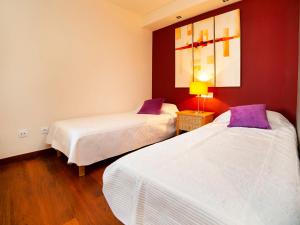Łóżko lub łóżka w pokoju w obiekcie Apartment Altea La Nova-10 by Interhome