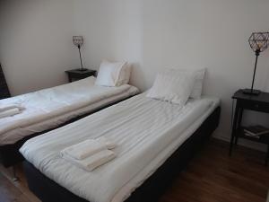 Postel nebo postele na pokoji v ubytování Melleruds Golfklubb Bed & Breakfast