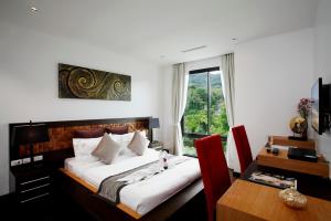 Ένα ή περισσότερα κρεβάτια σε δωμάτιο στο By The Lake Villas +47 φωτογραφίες