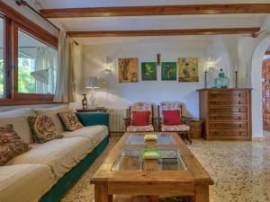 A seating area at Holiday Home Florencia by Interhome