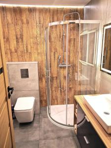 Kúpeľňa v ubytovaní Apartment Cyprys 1