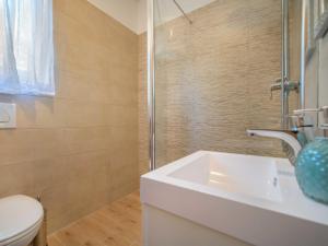 Koupelna v ubytování Holiday Home Ivona by Interhome