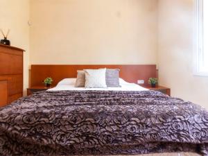 A bed or beds in a room at Holiday Home Villa Esplai by Interhome