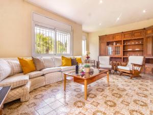 A seating area at Holiday Home Villa Esplai by Interhome Még 37 kép