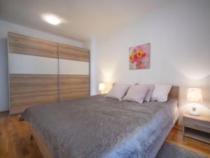 Postel nebo postele na pokoji v ubytování Holiday Home Ivona by Interhome