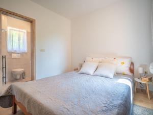 Postel nebo postele na pokoji v ubytování Holiday Home Ivona by Interhome