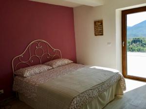 Кровать или кровати в номере Agriturismo LaValleggia