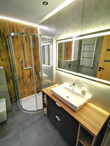 Kúpeľňa v ubytovaní Apartment Cyprys 1