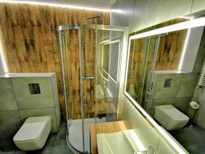 Kúpeľňa v ubytovaní Apartment Cyprys 1