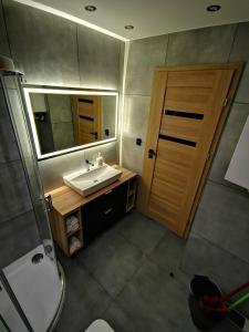 Kúpeľňa v ubytovaní Apartment Cyprys 1