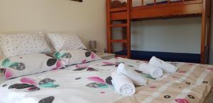 Postel nebo postele na pokoji v ubytování APARTMAN MASTER LUPI M&S