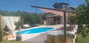 The swimming pool at or close to Stavlos
