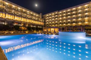 Bazén v ubytování Ariti Grand Hotel nebo v jeho okolí