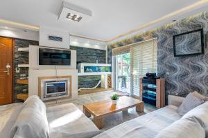 A kitchen or kitchenette at Spa Villa34 Family resort Renew, Relax, Revitalise