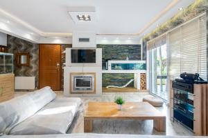 A kitchen or kitchenette at Spa Villa34 Family resort Renew, Relax, Revitalise