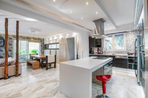 A kitchen or kitchenette at Spa Villa34 Family resort Renew, Relax, Revitalise