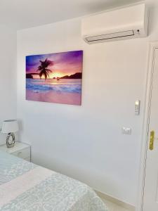 Postel nebo postele na pokoji v ubytování Villa Panoramic del Atlantico