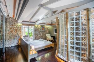 A bed or beds in a room at Spa Villa34 Family resort Renew, Relax, Revitalise