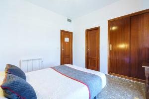 Postel nebo postele na pokoji v ubytování HOTEL RESTAURANTE MOYA