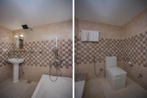 Koupelna v ubytování Hotel Deepshree + 37 fotografií