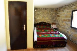 Llit o llits en una habitació de Pivnice Radosavljević - Ljubina pivnica 32 fotos més