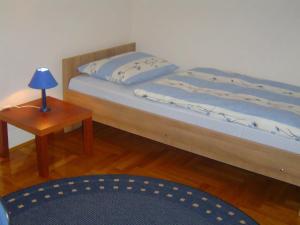 Postel nebo postele na pokoji v ubytování Apartmani Almica