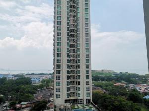a tall white building with a city in the background at Strait Garden Studio X Ace Pro @ George Town in George Town