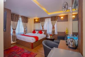 Postel nebo postele na pokoji v ubytování Hotel Deepshree