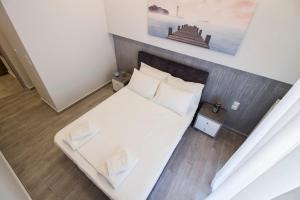 Posteľ alebo postele v izbe v ubytovaní FLOW - White Tower Two Bedroom Suite