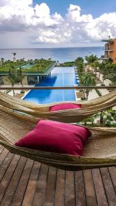 Bazén v ubytování Hotel Xcaret Mexico All Parks All Fun Inclusive nebo v jeho okolí
