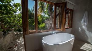 Ванная комната в Hotel Poc Na Tulum