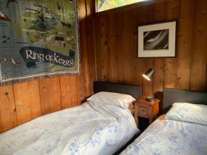 Ένα ή περισσότερα κρεβάτια σε δωμάτιο στο The Fuschias