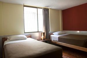 Letto o letti in una camera di Papachos Hostel