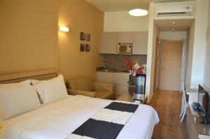 Postel nebo postele na pokoji v ubytování Nest 1 Hotel
